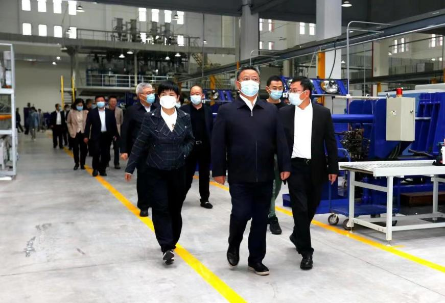 北碚區領(lǐng)導視察參觀(guān)華虹儀表“智能電網(wǎng)電能計量產(chǎn)業(yè)”項目基地